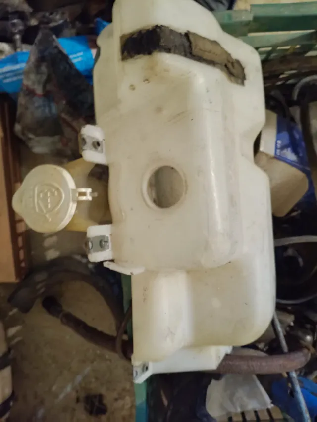 Botella lavafaros Montero V20