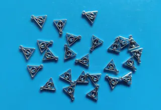 Lote 25 abalorios para bisutería Harry Potter