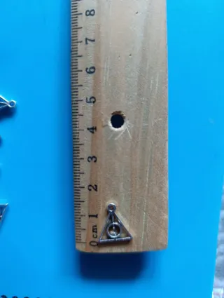 Lote 25 abalorios para bisutería Harry Potter