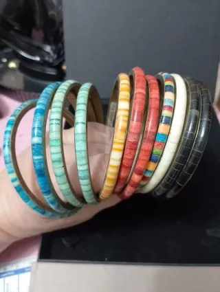 Lotto 11 bracciali in osso