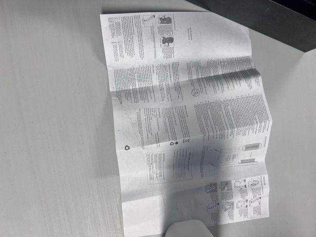 Rizador de cabello negro y dorado