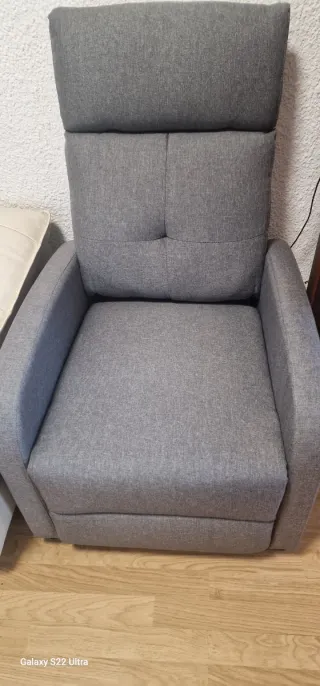 Sillón reclinable de tela gris