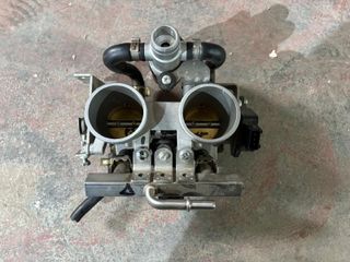 Cuerpo aceleracion TRK 502 admision mariposa