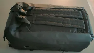 Bolsa-Mochila de viaje para traje impermeable.