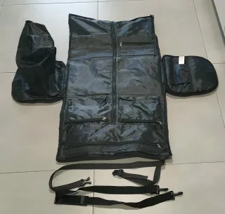 Bolsa-Mochila de viaje para traje impermeable.