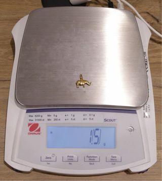 COLGANTE RINOCERONTE, ORO 18K/1.5g