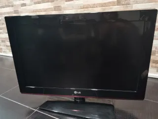 Televisor LG Negro y Rojo