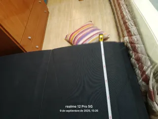 Sofá cama azul marino con arcón