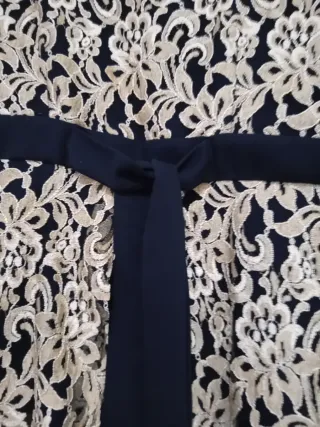 Casacca elegante nera e oro