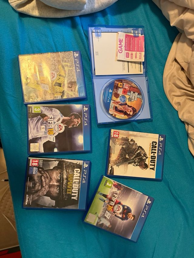 Playstation 4 con mando y juegos