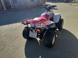 Quad Polaris Trail Boss 325 Rosa. año 2000