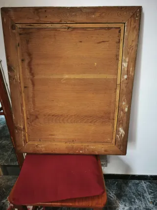 Espejo antiguo con marco dorado