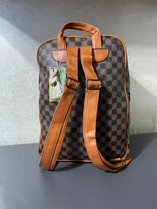 Zaino uomo marrone fantasia geometrica