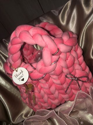 Borsa intrecciata rosa con strass