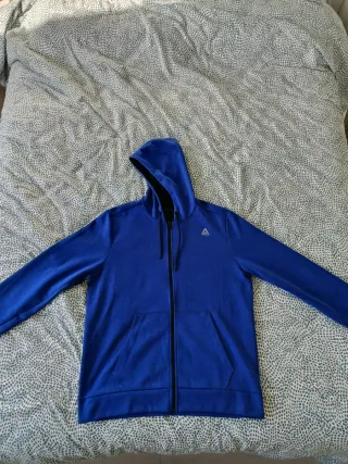 Chaqueta deportiva Reebok azul con capucha