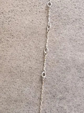 Cadena de plata rota con colgante