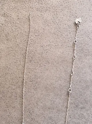 Cadena de plata rota con colgante