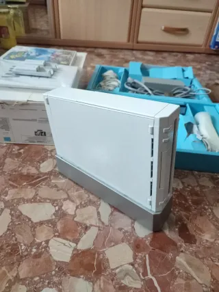 Wii + "Rabids mi casa" y "wii sports"