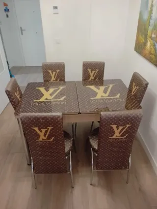 Conjunto mesa y 6 sillas Louis Vuitton extensible