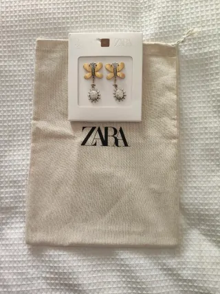 Pendientes mariposa y sol Zara sin estrenar