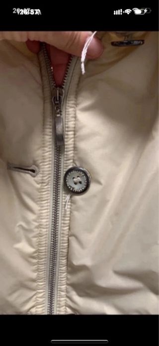 Piumino donna champagne con collo ampio