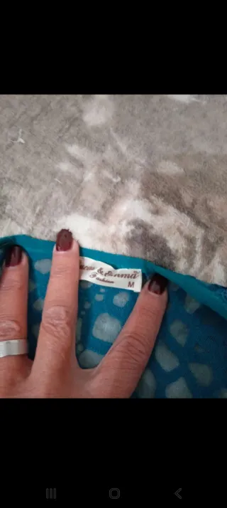 Abito elegante scollato con corpetto lavorato