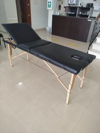 Camilla de masaje portátil y plegable.