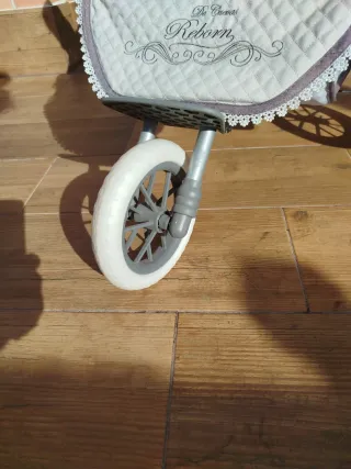 Carrito gemelar de juguete