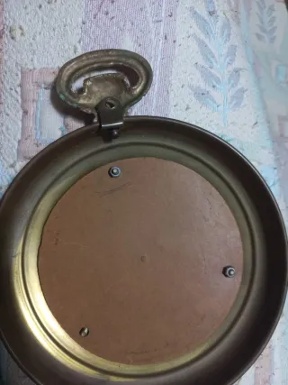 Espejo decorativo dorado estilo reloj