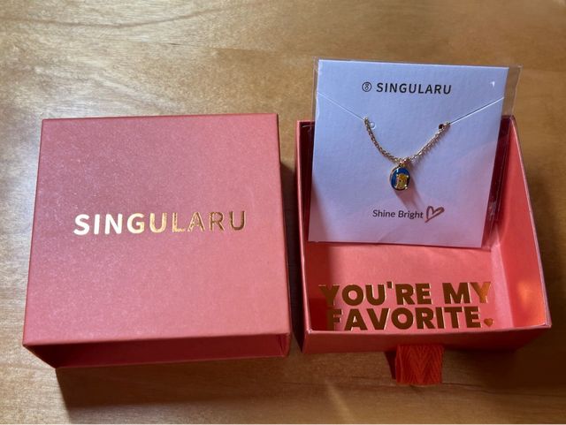 Collar Singularu azul y dorado