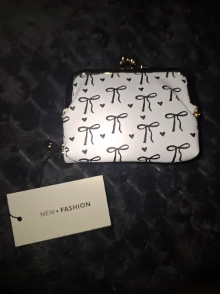 Portatessere e portamonete con fiocchi