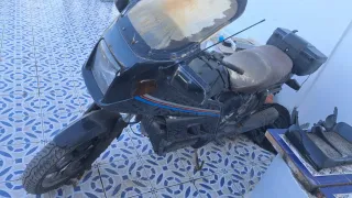 Moto BMW 1100 sin papeles y sin llave algo negocia