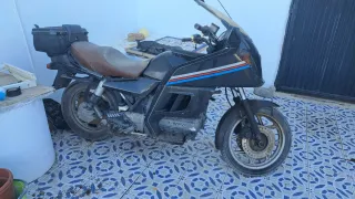 Moto BMW 1100 sin papeles y sin llave algo negocia