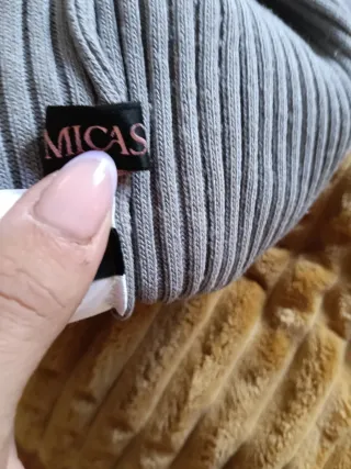 Top Micas gris cuello alto sin mangas talla M