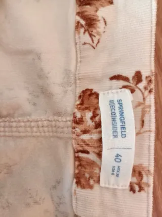 Peto floral beige y marrón