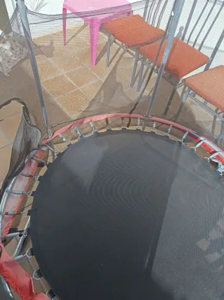 Cama elástica con red de seguridad