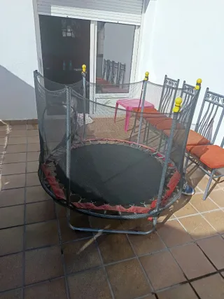 Cama elástica con red de seguridad