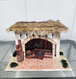 Casa Portal de Belén Tienda de Alfombras.