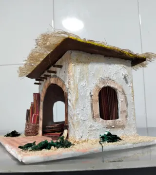 Casa Portal de Belén Tienda de Alfombras.