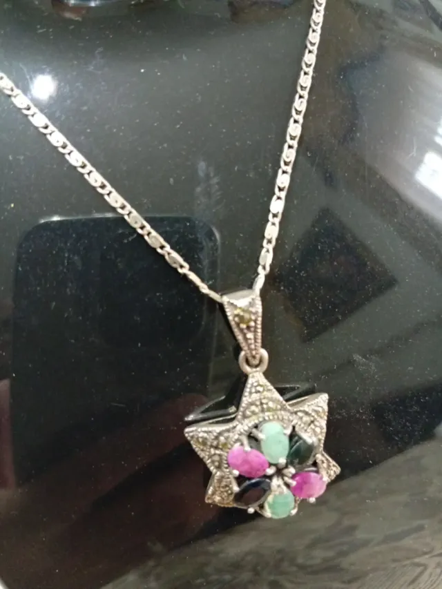 Completo argento con pietre rubino