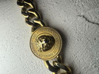 Pulsera Guess León Dorada