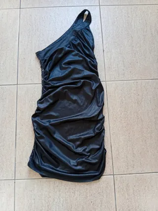 traje de mujer. para noche.