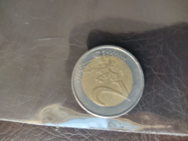 Moneda 2 euros. 2002 error leve acuñación