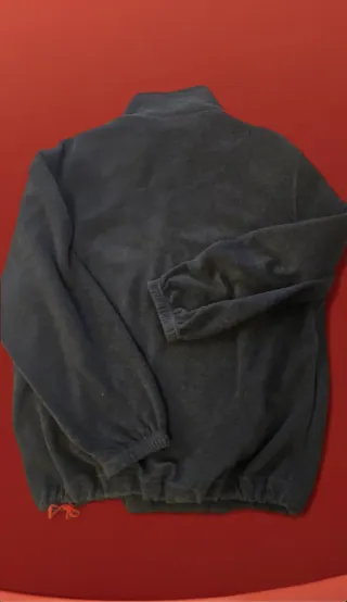 Maglione in pile con cerniera sul collo