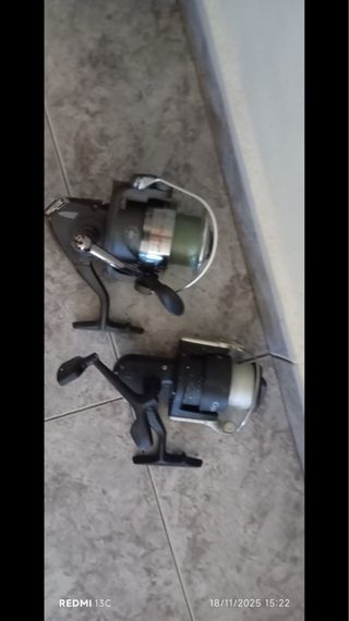 caña de pescar + funda y 2 carretes.