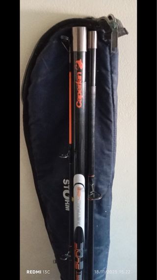 caña de pescar + funda y 2 carretes.