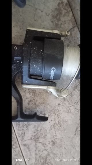 caña de pescar + funda y 2 carretes.