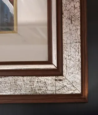 Cornice in legno argentato