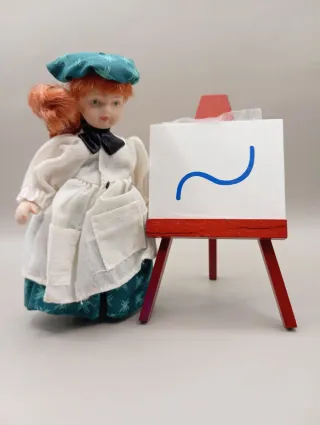 Bambola di porcellana con tela