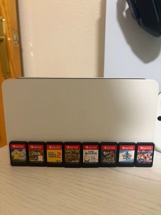 Nintendo switch OLED+complementos + 8 Juegos